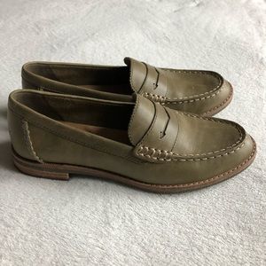 Olive green leather top siders with wood heel.